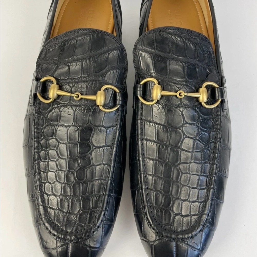 Gucci Black and Gold Loafers with Horsebit Detailing